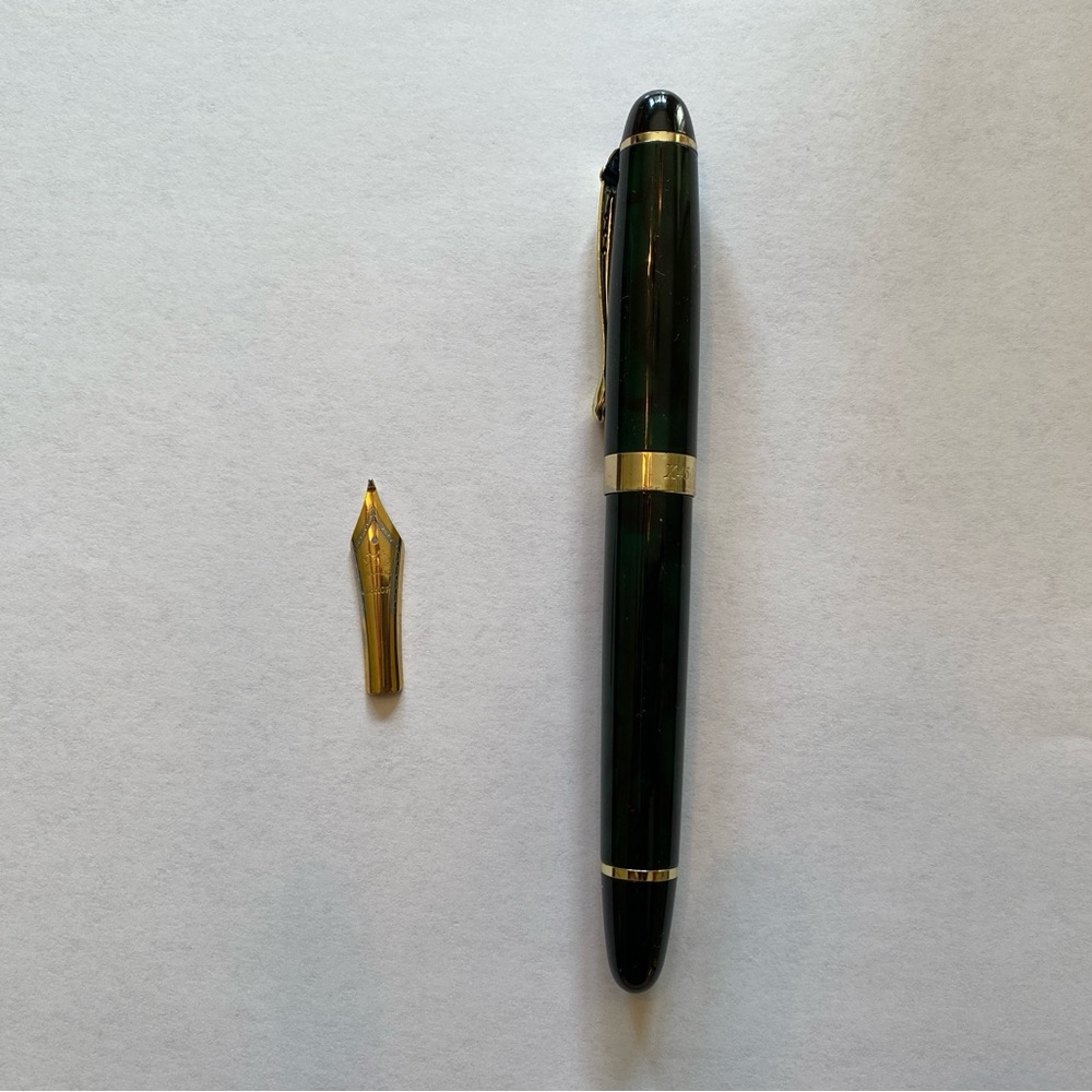 Jinhao x450 black, dark green, and gold fountain pen
